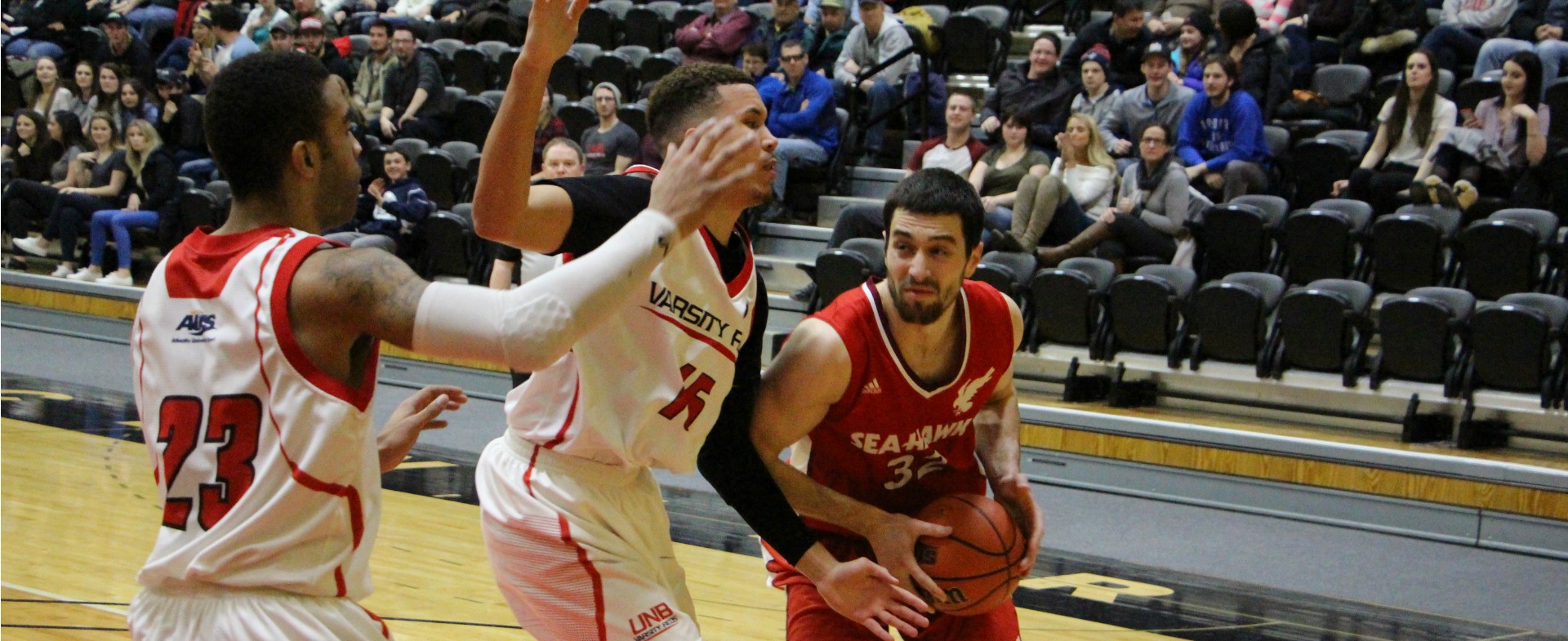 Varsity Reds score comeback victory over Hawks