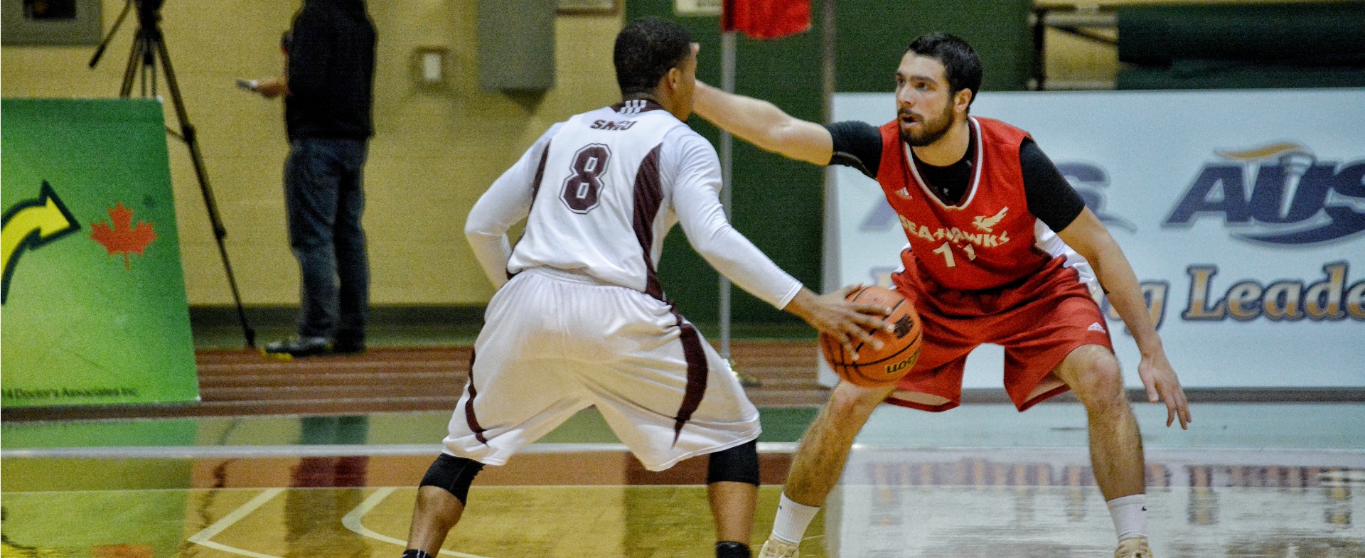 Sea-Hawks split weekend with Huskies
