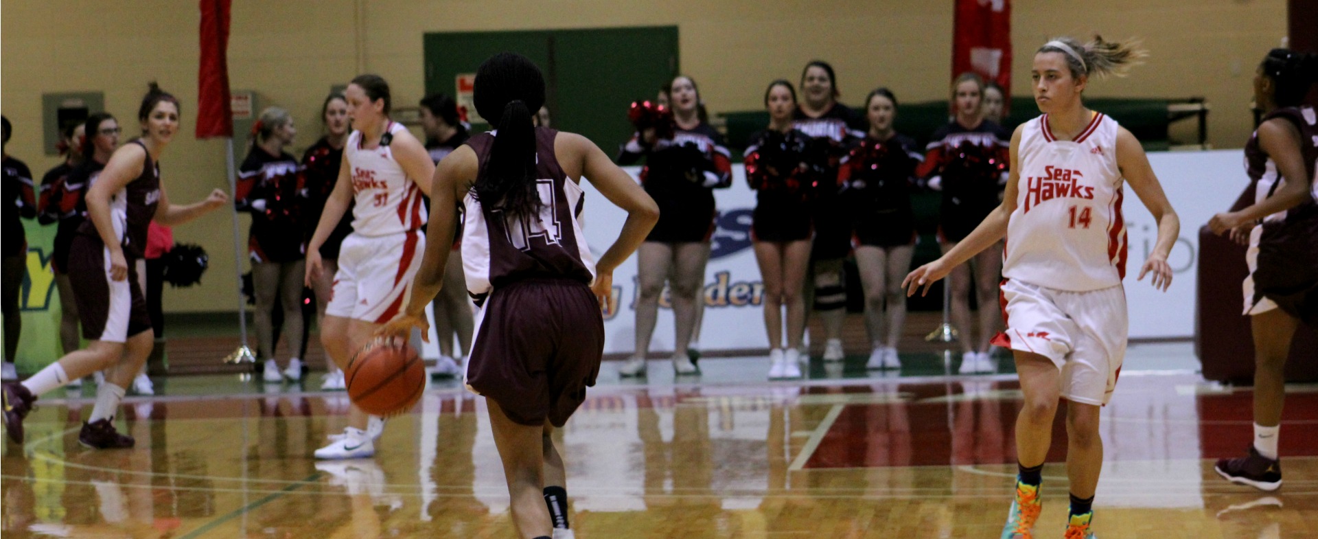Hawks outlast Huskies at home