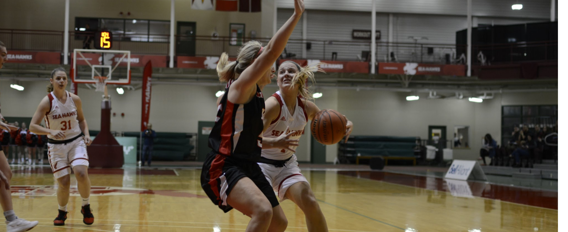 Hawks Top Reds In Home-Opener